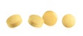Set of yellow round pills on white background Royalty Free Stock Photo