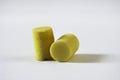 Set of yellow spongy earplugs.