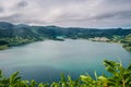 Sete Cidades and its twin lagoons, green and blue with fog in the mountains, SÃ£o Miguel - Azores PORTUGAL Royalty Free Stock Photo