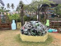 A large pile of glass bottles stacked in a yard. Royalty Free Stock Photo