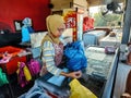 Bayu Keropok Lekor workers selling fish sausage crackers