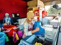 Bayu Keropok Lekor workers selling fish sausage crackers