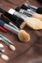 Seto of make up artists brushes laying on the table, clean and ready to use. Space for text Royalty Free Stock Photo