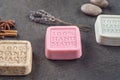 Sets of handmade ornamental soaps on black board, product of cosmetics or body care