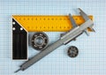 Setsquare and calliper with bearing Royalty Free Stock Photo