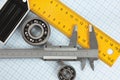 Setsquare and calliper with bearing Royalty Free Stock Photo