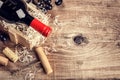 Setting with bottle of red wine, grape and corks. Wine list concept Royalty Free Stock Photo