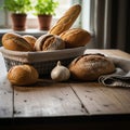 Setting features assorted breads displayed in a lined, wire basket Royalty Free Stock Photo
