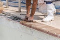 Setting new brick coping pool remodel Royalty Free Stock Photo