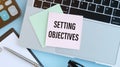 Setting Objectives text written on a paper with