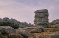 The Setting sun casts pink colours into the sky, and over the Limestone rock formations at El Torcal in Spain. Royalty Free Stock Photo