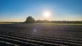 Sunset over Plowed Agricultural Field Royalty Free Stock Photo