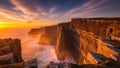 Golden hour sunset over dramatic sea cliffs and ocean waves Royalty Free Stock Photo