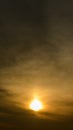 Setting sun in atmospheric haze. warm sunset back light. 16:9 vertical aspect ratio for atmospheric design