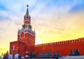 setting sun and fantastic sky above Kremlin wall and Kremlin's Spassky Tower Royalty Free Stock Photo