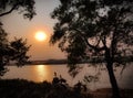 The setting sun in the Gangas. river Royalty Free Stock Photo