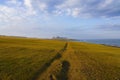 Setting sun lights up the Northumbrian coastline Royalty Free Stock Photo