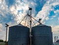 Farm produce storage system. A modern community grain elevator with a weigh station Royalty Free Stock Photo