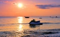 The setting sun sea, fishing boats, motor boats Royalty Free Stock Photo