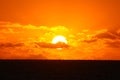 The setting sun on the sea in a tropical island, Fiji Royalty Free Stock Photo