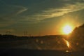 Setting Sun - View Through Car Windshield