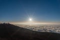 Setting sun viewed from the top of Haleakala crater on Maui Royalty Free Stock Photo