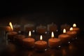 Setting tealight candles in a shape of a heart Royalty Free Stock Photo