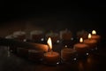 Setting tealight candles in a shape of a heart Royalty Free Stock Photo