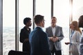 Setting time aside to exchange ideas. a group of corporate businesspeople meeting in their boardroom. Royalty Free Stock Photo