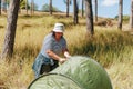 Trailside Tranquility Overweight Woman Crafts Comfortable Campsite, Making a Tent in the Woodland