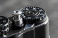 Settings mechanism on mirror analog film camera. Rotation, using mechanical wheel. Vintage photo camera, 35mm film, made in USSR, Royalty Free Stock Photo