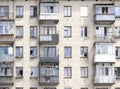 Settled crumbling buildings with broken Windows