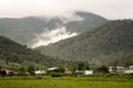 The settlement of Bario in the Borneo highlands. Surrounded by mountains covered in mist. Brio, Borneo, Malaysia Royalty Free Stock Photo