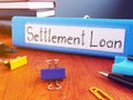 Settlement Loan is shown on the conceptual business photo Royalty Free Stock Photo