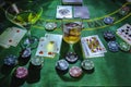 Setup for playing Blackjack at the Casino. WHisky and Martini glasses on the table