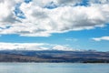 Sevan lake and white clouds blue sky on a sunny day, Armenia Royalty Free Stock Photo