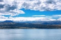 Sevan lake and white clouds blue sky on a sunny day, Armenia Royalty Free Stock Photo