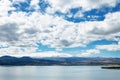 Sevan lake and white clouds blue sky on a sunny day, Armenia Royalty Free Stock Photo