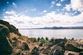 Sevan lake and white clouds blue sky on a sunny day, Armenia Royalty Free Stock Photo