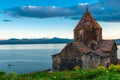 Sevanavank Monastery and Lake Sevan. Dramatic sky at sunset Royalty Free Stock Photo