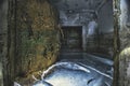 Rusty protective airtight door, in an abandoned flooded shelter, in ice Royalty Free Stock Photo