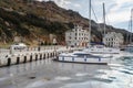 Parking yachts near embankment at Balaklava bay in spring. Crimea