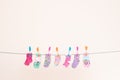 Seven Babies Socks On Washing Line Landscape