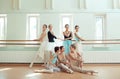 The seven ballerinas at ballet bar Royalty Free Stock Photo