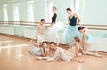 The seven ballerinas at ballet bar Royalty Free Stock Photo