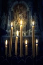 Seven candles in the Christian Church on the icon background. Ab