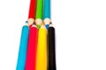 Seven colored pencils. The colors red, green, blue, cyan, magenta, yellow and black. Royalty Free Stock Photo