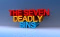 the seven deadly sins on blue Royalty Free Stock Photo