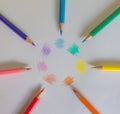Seven different colored pencils arranged in a circle Royalty Free Stock Photo