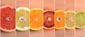 Seven different types of citrus arranged by size